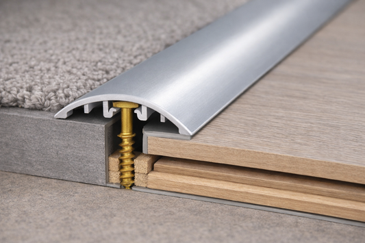 30mm aluminium 4-in-1 threshold trim fitted at door to create smooth floor transition