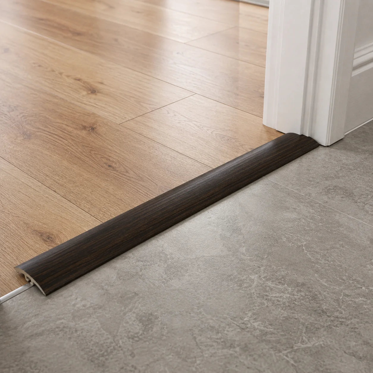 30mm PVC door threshold profile with a realistic wood effect finish.