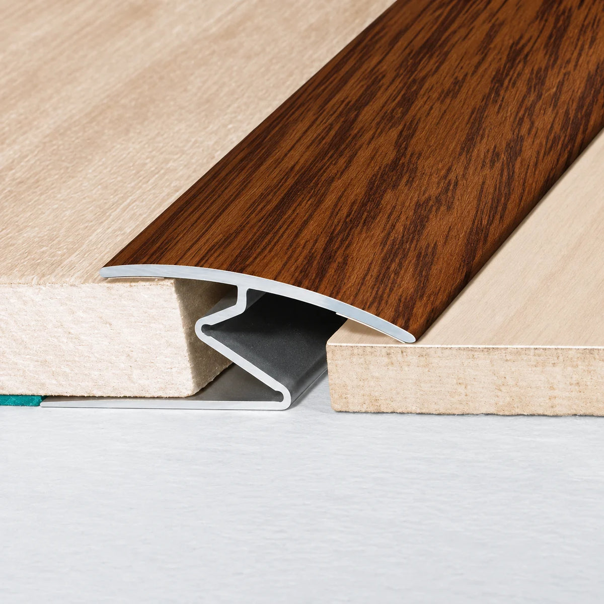 Aluminium 32mm Z Floor Transition Strip in Wood Effect Finish ideal for finishing flooring edges and transitions across internal doorways.