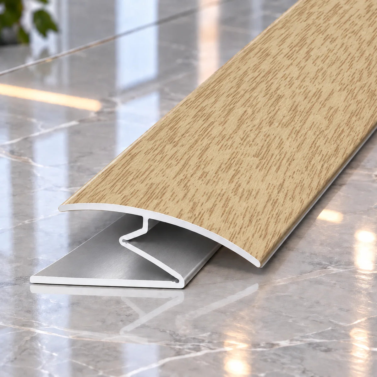 32mm Aluminium Z Transition Profile with Wood Effect Finish suitable for creating a tidy connection between different flooring surfaces.