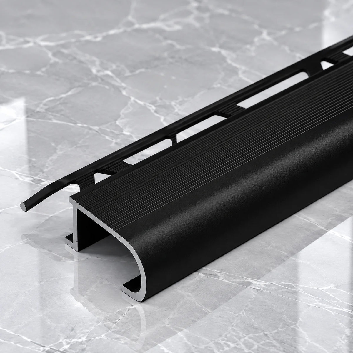 Durable Aluminium Tile-In Stair Nosing Trim Featuring a 34x11x10mm Profile, Ideal for Creating Neat and Protected Stair Edges on Ceramic and Porcelain Tiled Staircases.