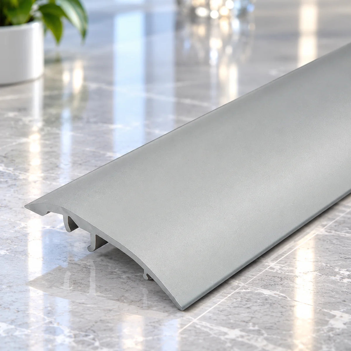4-in-1 37mm Aluminium Flooring Transition Strip offering an adjustable solution for floor joints, edges and doorway transitions.