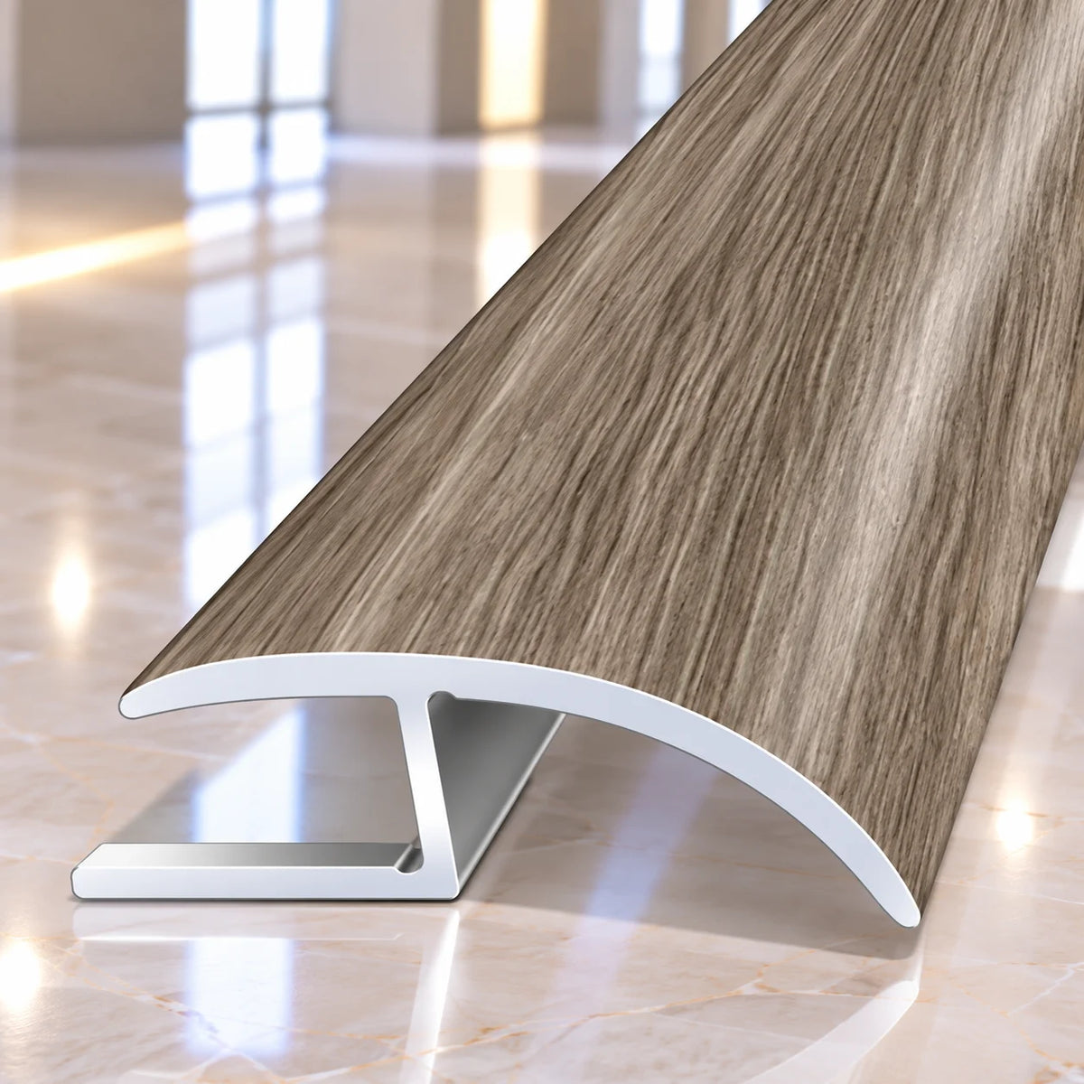 Wood grain aluminium floor joining strip designed to cover expansion gaps and provide a clean decorative finish between adjoining floor coverings.