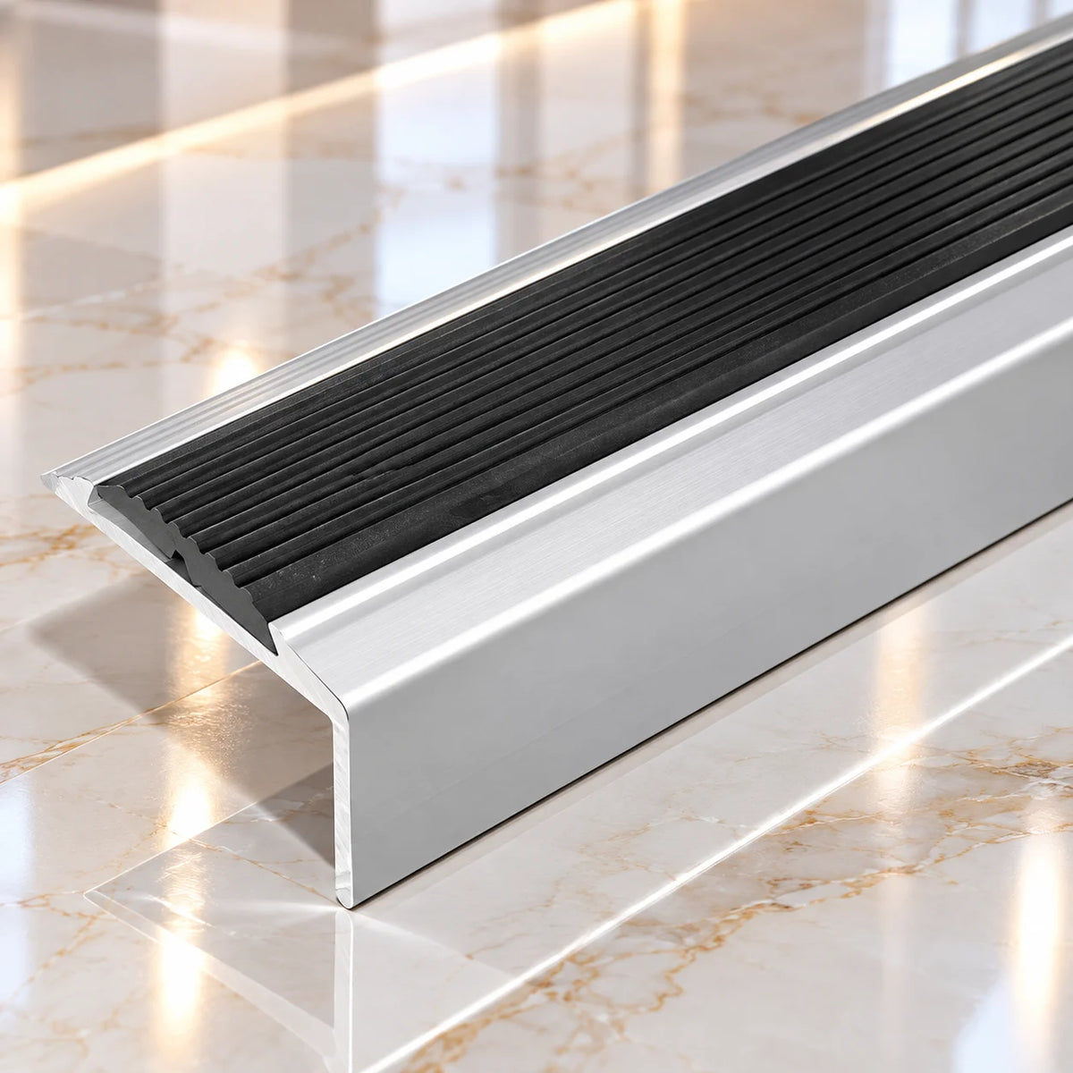 Premium aluminium stair nosing with a 46mm horizontal tread and 30mm vertical riser, featuring a slip-resistant surface for enhanced underfoot grip.