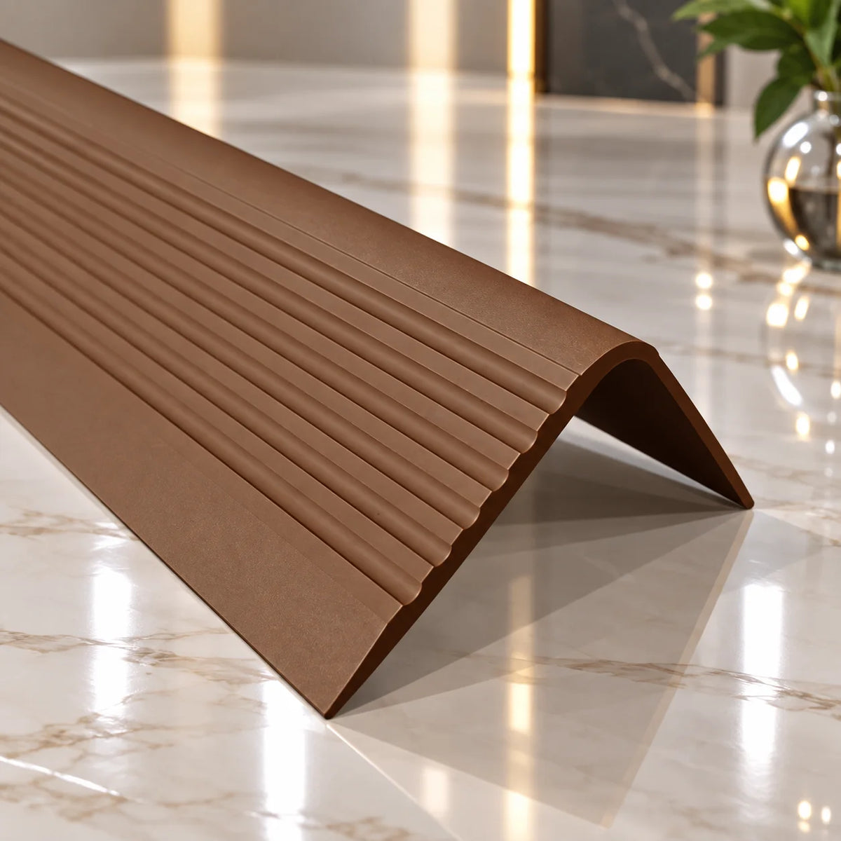 70x40mm PVC Non-Slip Stair Edge Nosing 730 featuring a flexible design suitable for finishing and protecting stair tread edges.