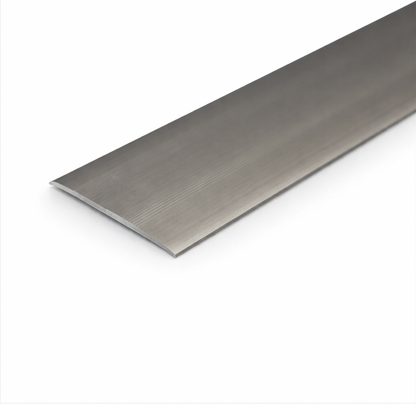 Inox Anodised aluminium flat door threshold strip with self-adhesive backing for quick, drill-free installation.