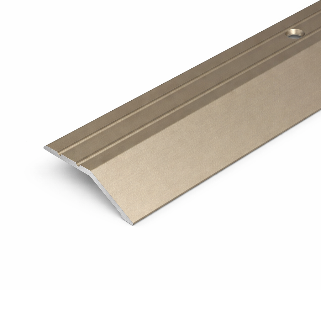 Champagne A11 anodised aluminium ramp door threshold profile providing a gradual and durable floor transition.