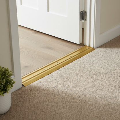 Usage of a slim 25mm anodised aluminium flat threshold strip creating a smooth and tidy floor transition.