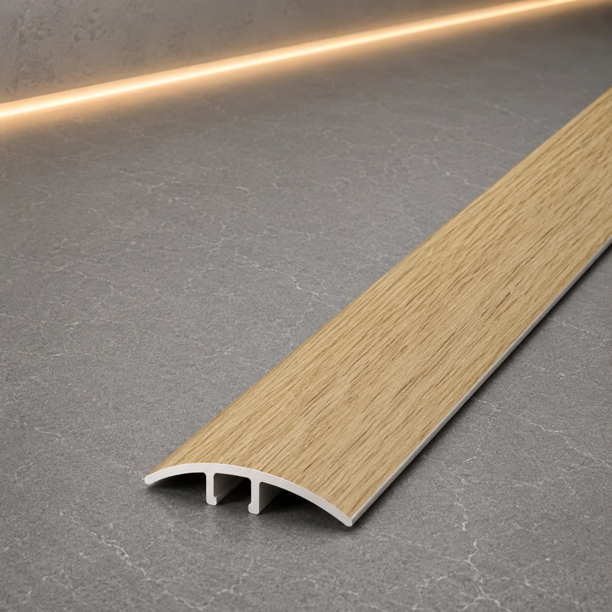 E64 40mm Pvc Wood Effect Door Threshold Strip in Cognac Oak Color