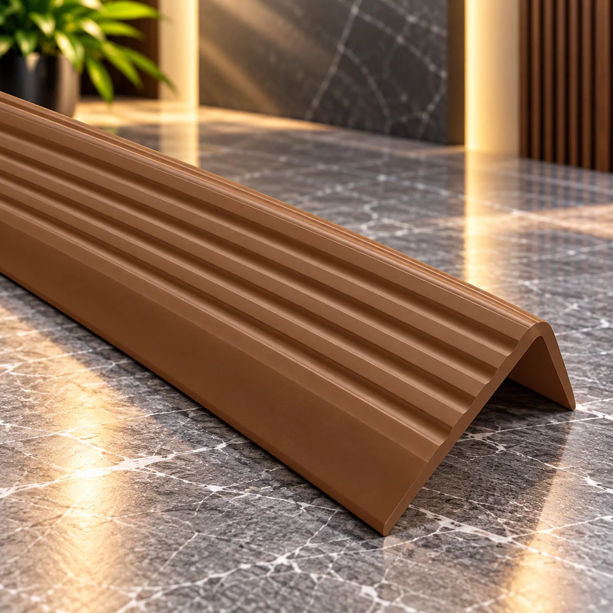 Heavy-duty flexible anti-slip stair edging profile 735-ND with self-adhesive backing for quick installation without drilling or screws.