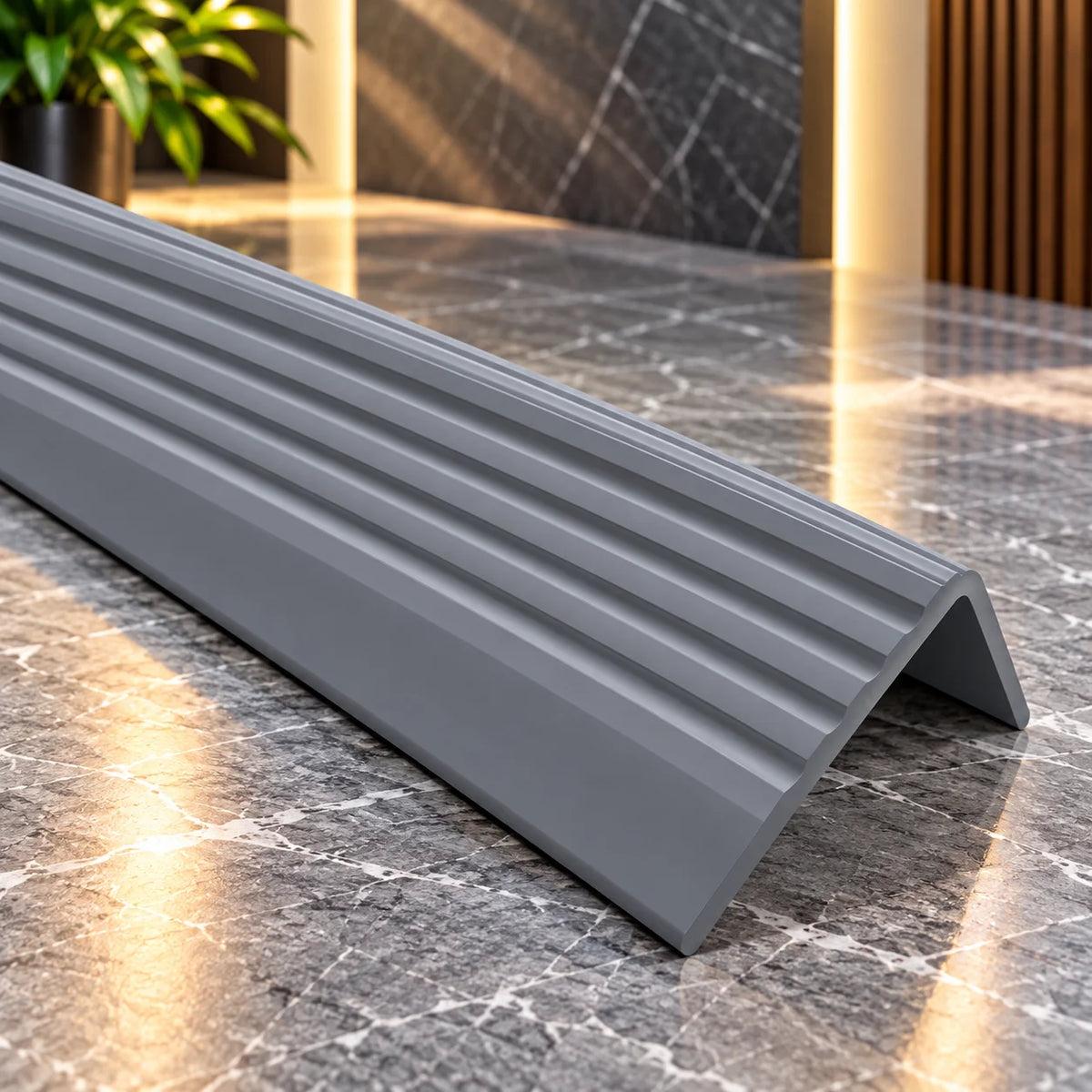 Durable flexible anti-slip stair nosing 735-ND designed to provide secure footing and protect exposed stair edges against everyday wear.