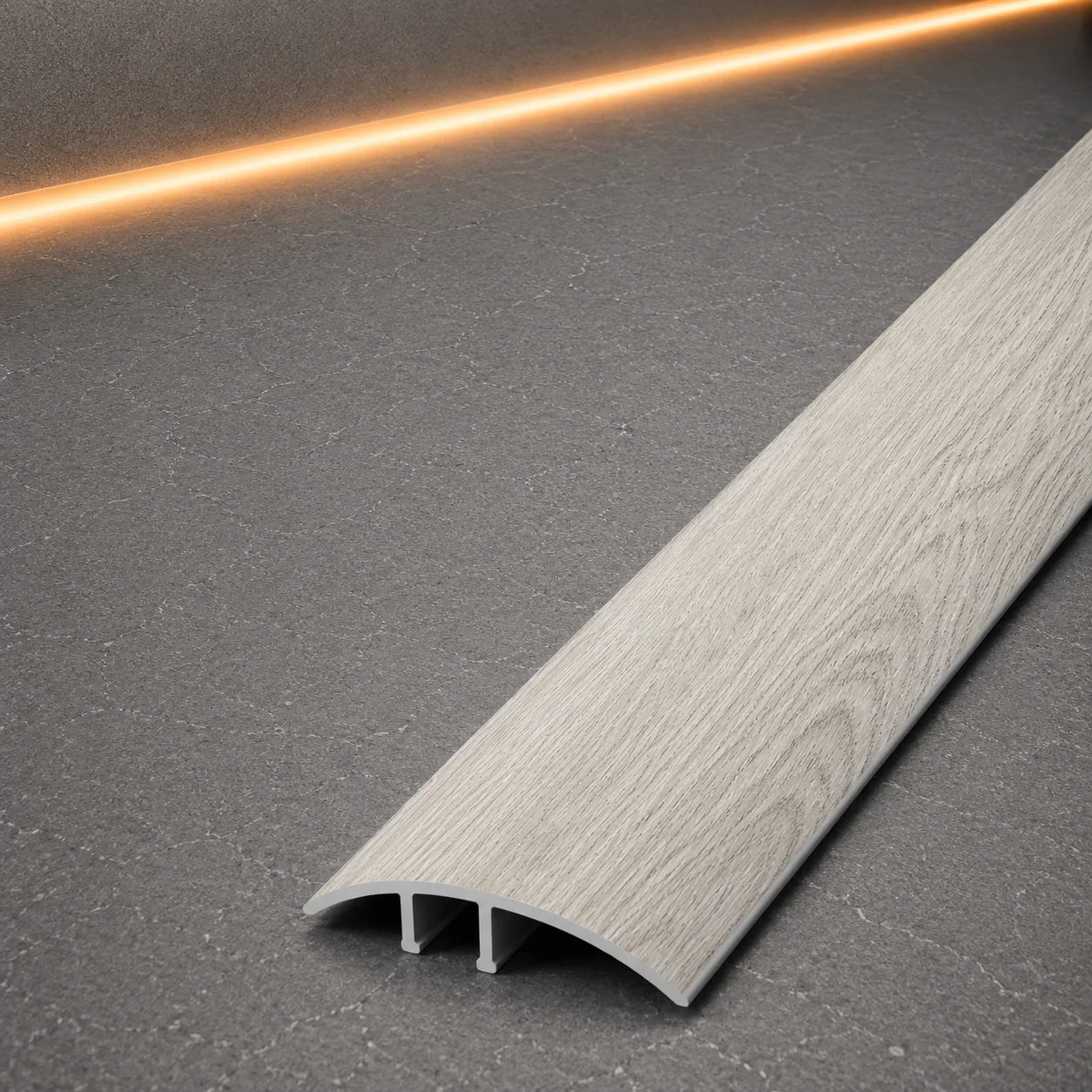 E64 40mm Pvc Wood Effect Door Threshold Strip in Malaga Oak Color