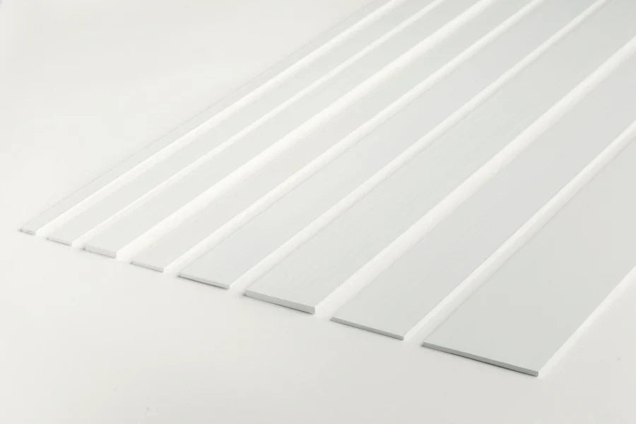 Close Up of White PVC Plastic Flat Bar Strip