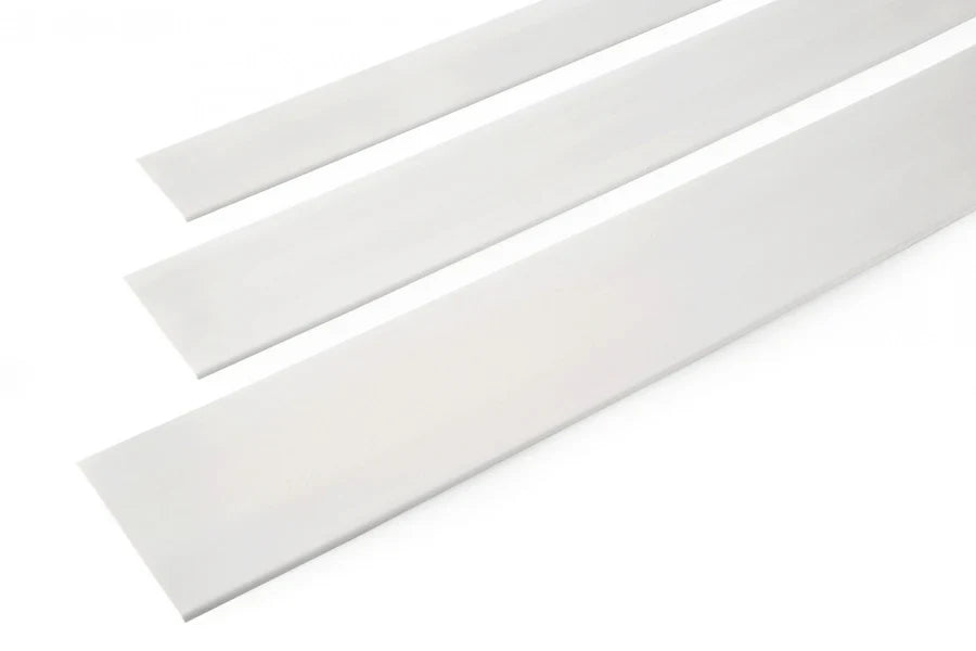 Close Up White PVC Plastic Bar Strip Roll Flat Architrave Trim 