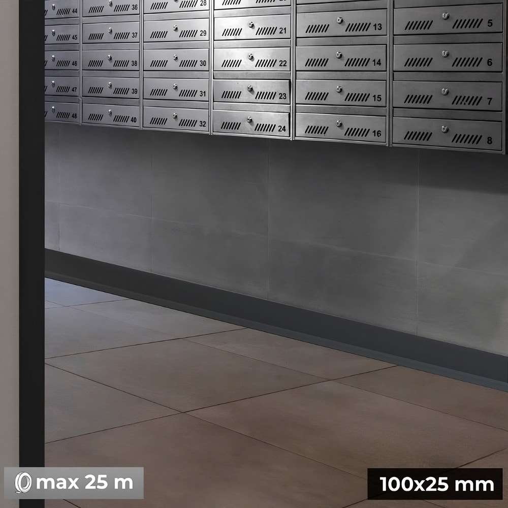 Row of metallic mailboxes with numbers on a tiled floor.